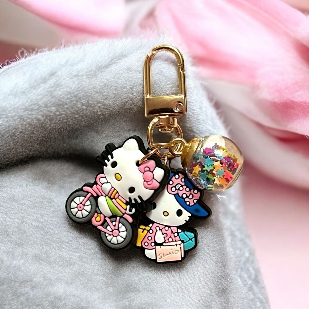 Hello Kitty Shopping Biking Confetti Ball Gold Tone Bag Charm Zipper Pull